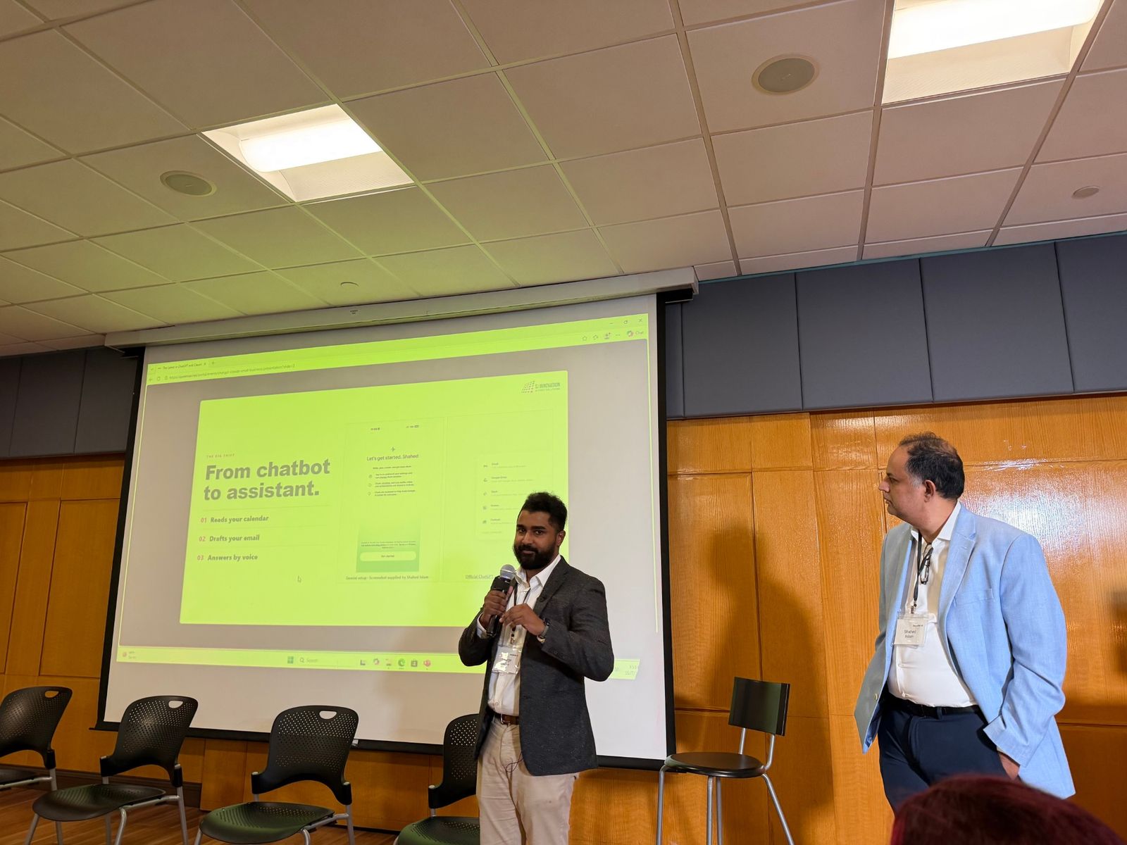 Our team on stage explaining how AI can work like an assistant
